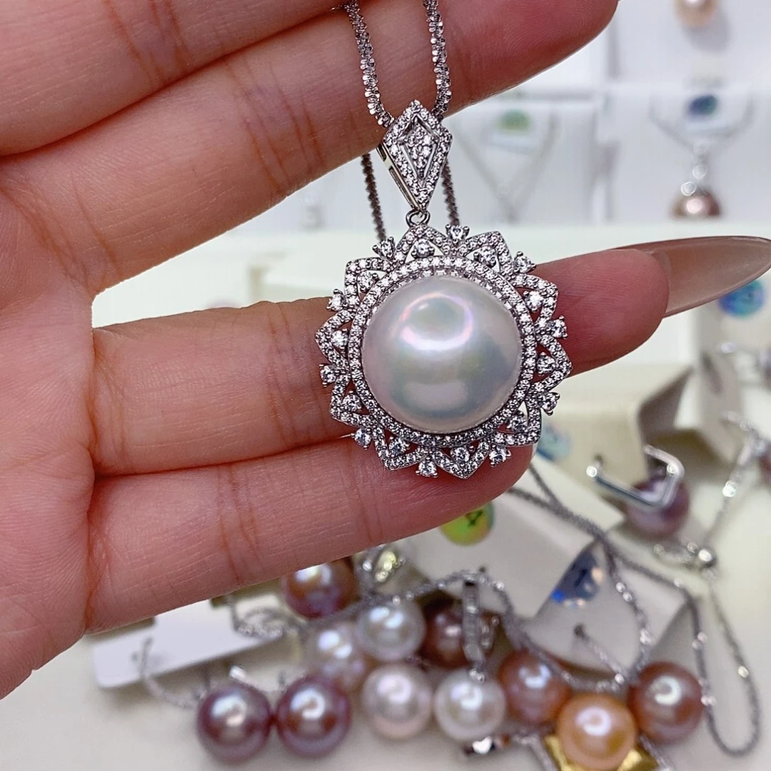 橘***.银S925镶嵌吊坠(赠链)淡水珍珠