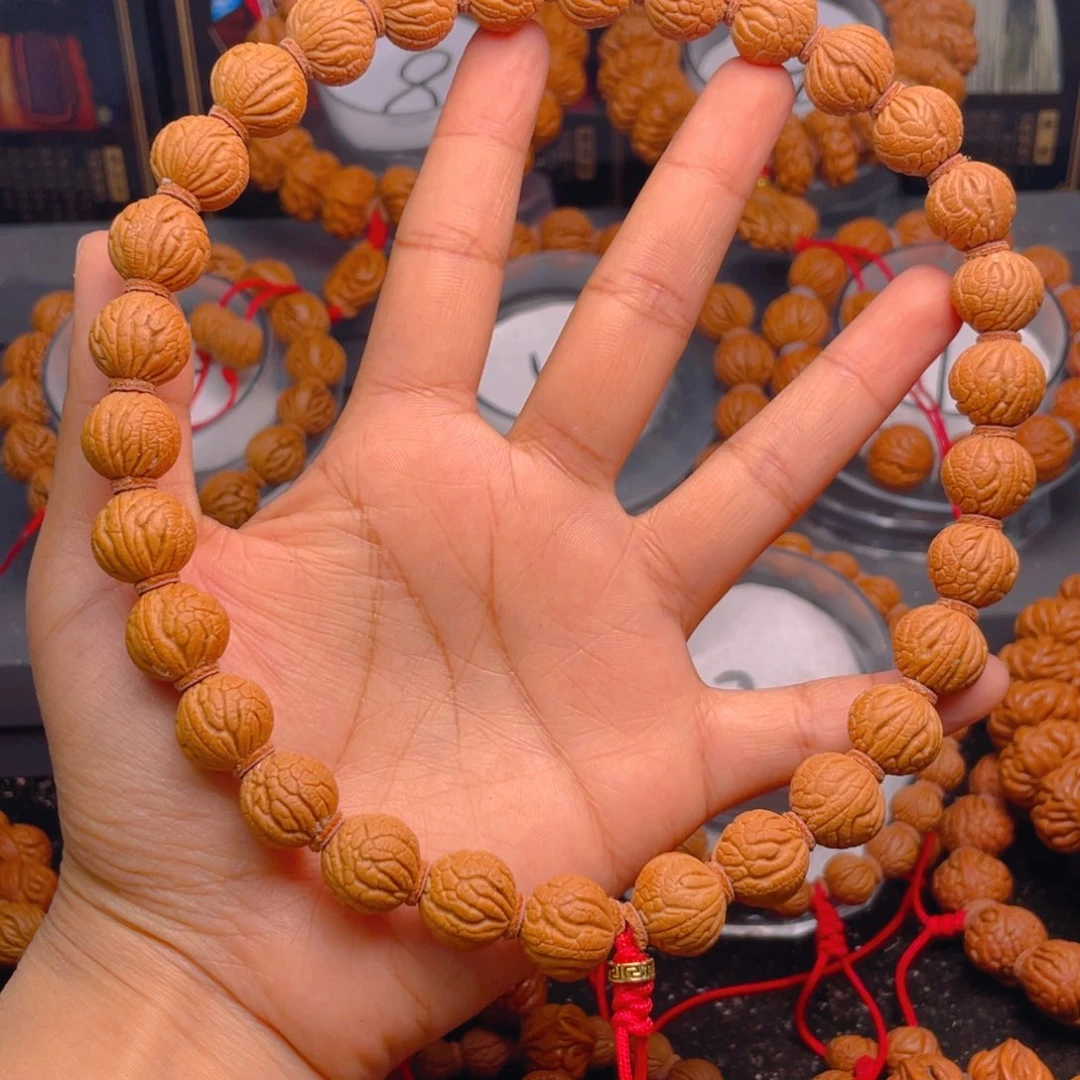 桃核手串赛*人红红火火23