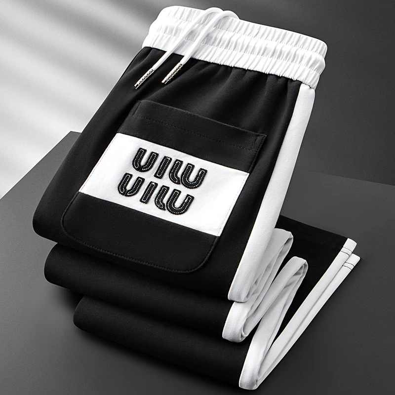 高级感春夏薄款撞色拼接运动卫裤男修身时尚字母刺绣男士休闲裤