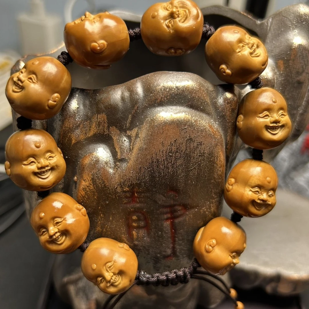 橄榄核精工雕刻十分开心文玩手串