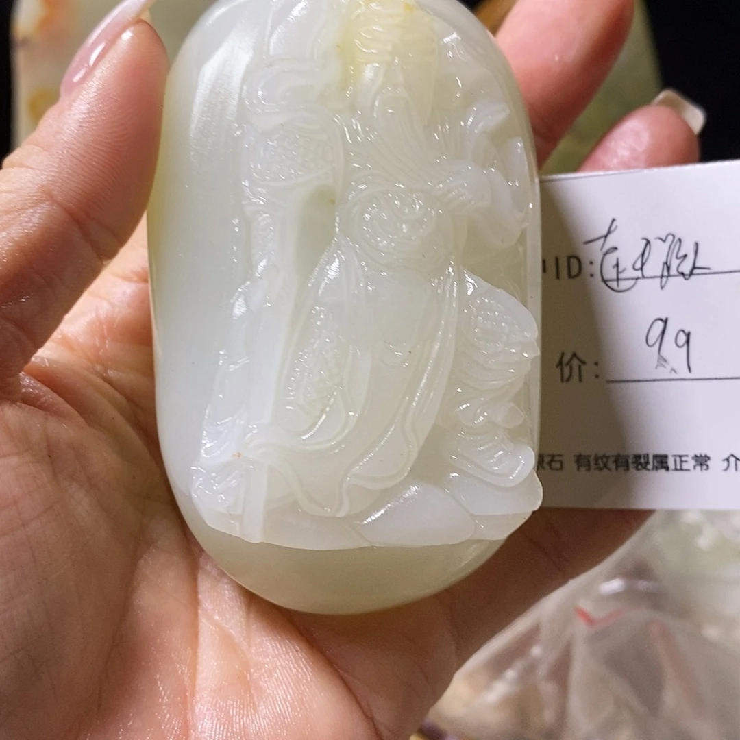 石材赶*人古青石手把件