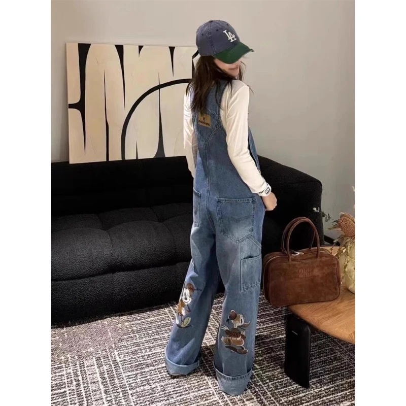 超好看卡通印花牛仔背带裤女2025新款松弛感穿搭显瘦阔腿连体裤子