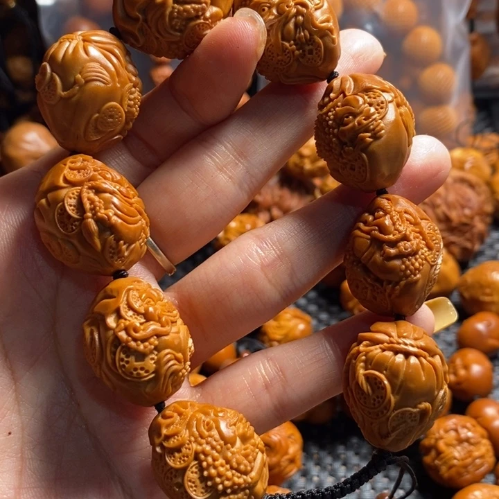 橄榄核吊坠金蟾手串
