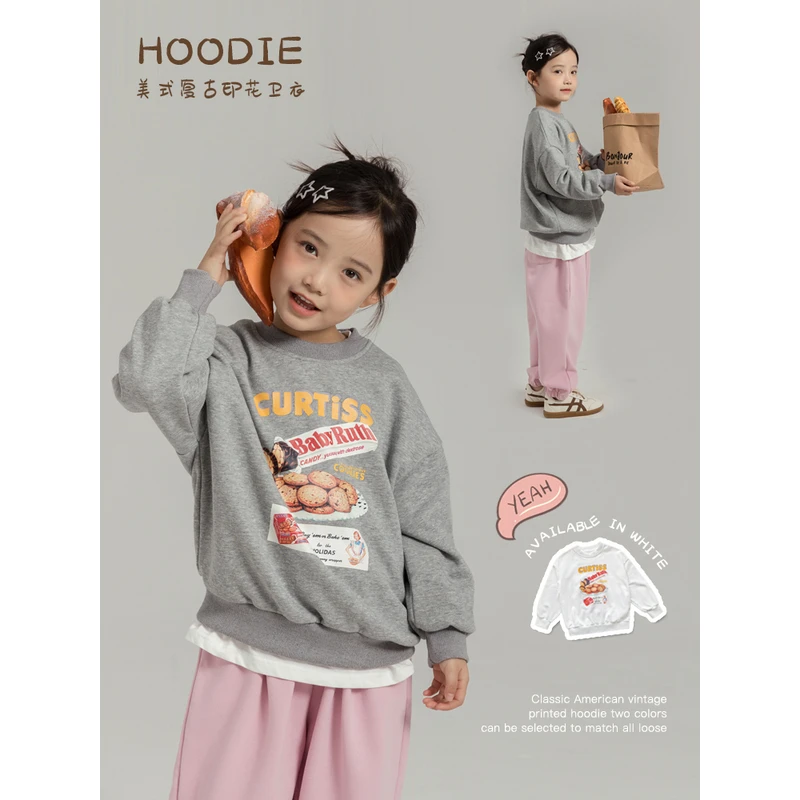 23S0582装女童卫衣秋季洋气儿童宽松休闲饼干印花长袖上衣