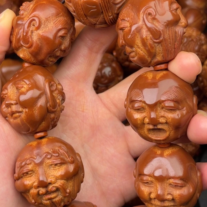 前***锦文玩核桃吊坠橄榄核