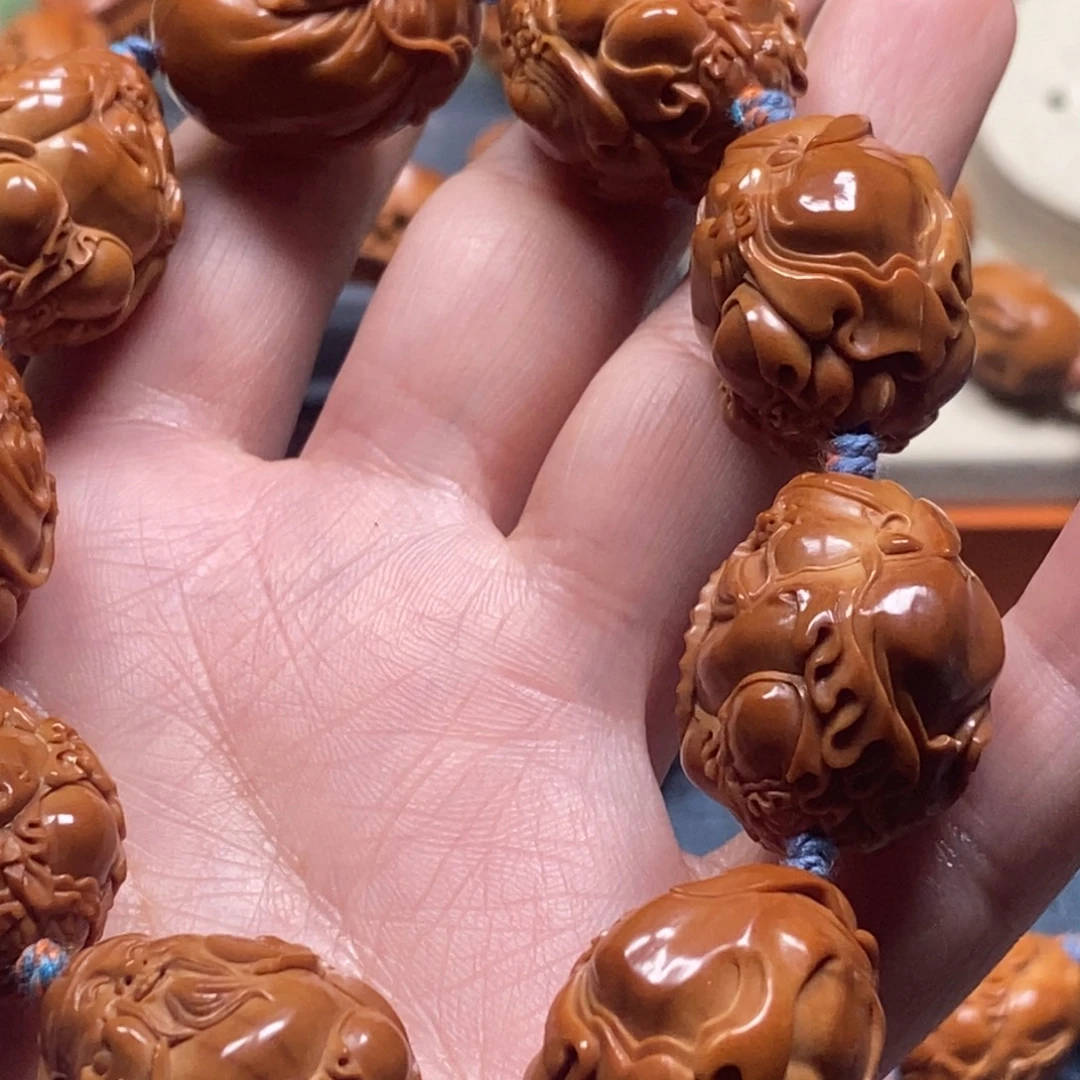 黑***长橄榄核吊坠大财神