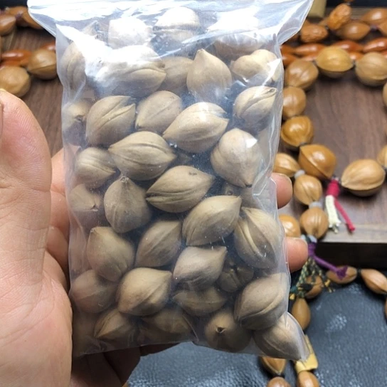 吊坠橄榄核袋装开口笑橄榄核