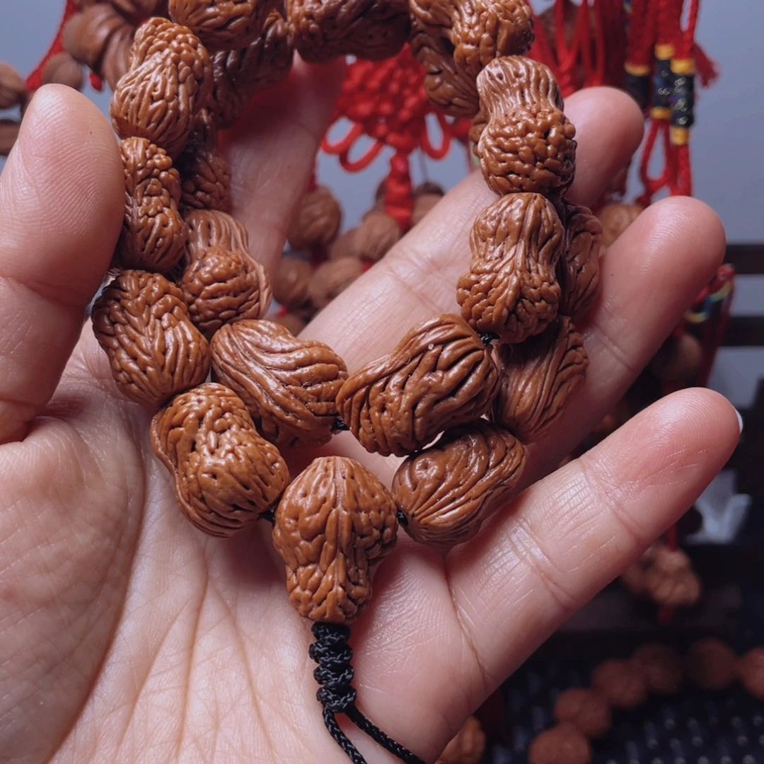 木质类龙纹桃枭手串