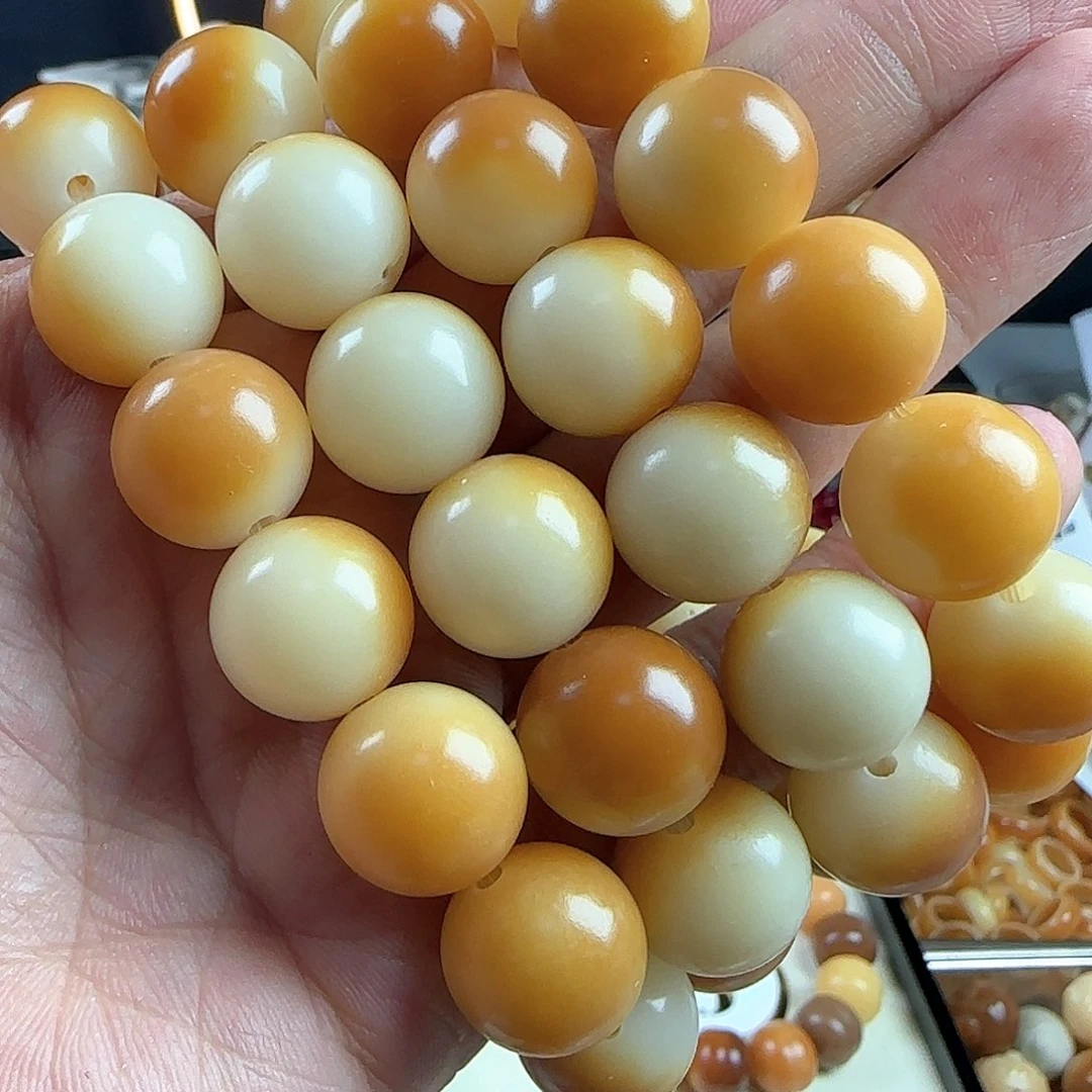 菩提根/象牙果手串瑕疵卡15落日长河手串一条