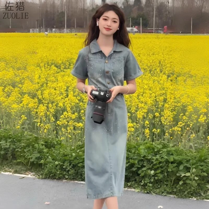 时尚牛仔连衣裙女夏季新款重工烫钻收腰A字裙气质收腰开叉中长裙