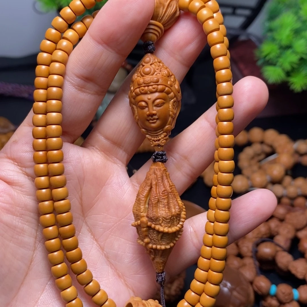 吊坠猴头核桃橄榄核雕刻橄榄核雕刻