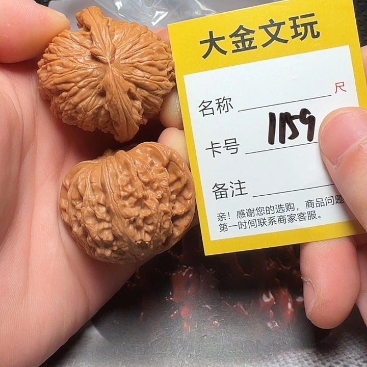 文玩核桃吊坠白狮子
