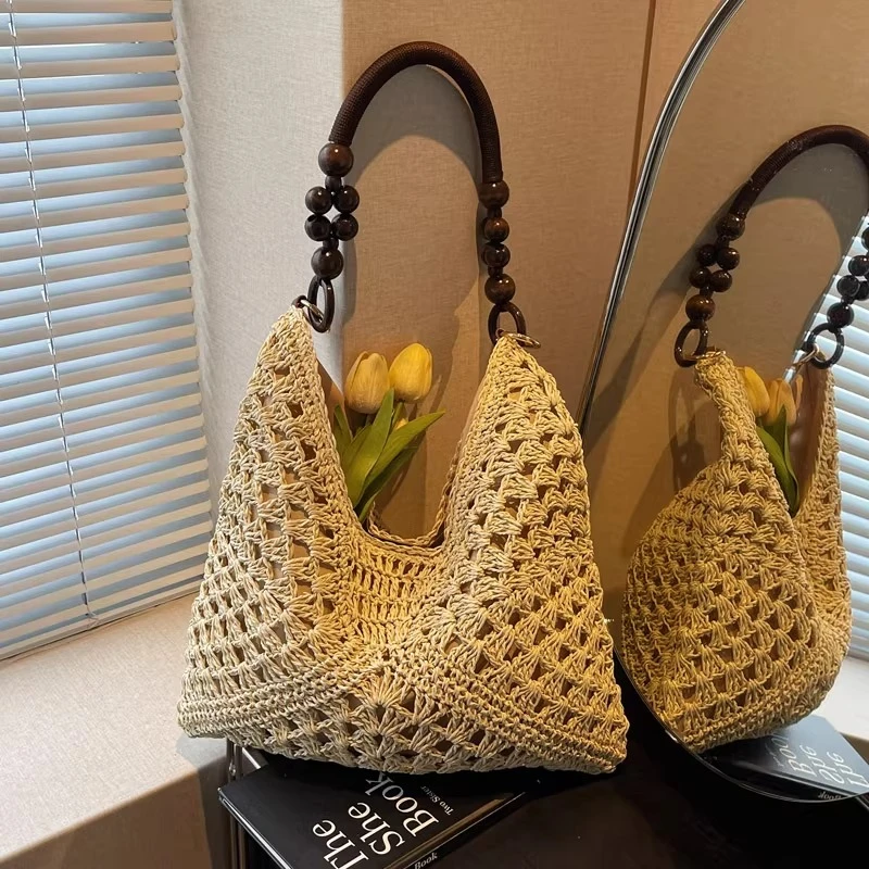 夏天草编包包女2025新款海边度假沙滩镂空单肩托特包编织菜篮子包