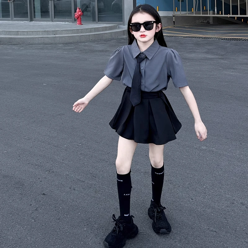 女童学院风气质套装2025年夏新款宽松短袖衬衣泡泡袖百褶裙两件套