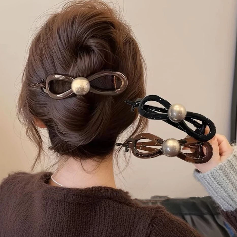 蝴蝶结气质一字抓夹女2025新款高级感扭扭发夹后脑勺鲨鱼夹子