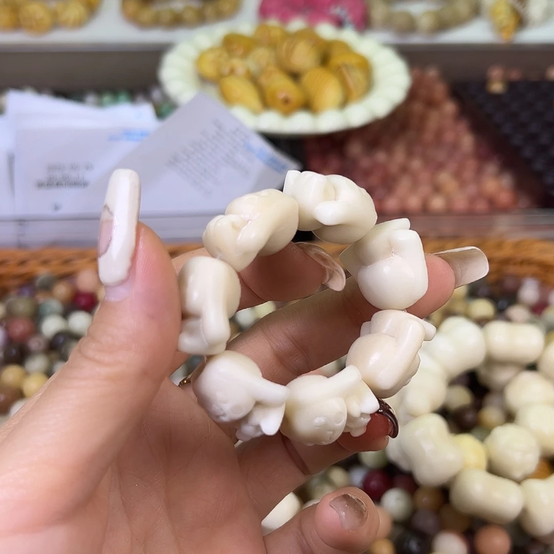 菩提根/象牙果吊坠瑕疵玉桂狗手捻1条有裂