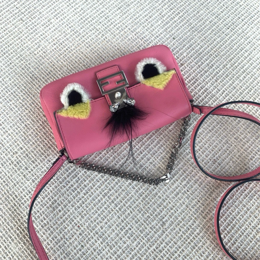 95新 FENDI/芬迪 fendi 糖果粉小怪兽手提斜挎包