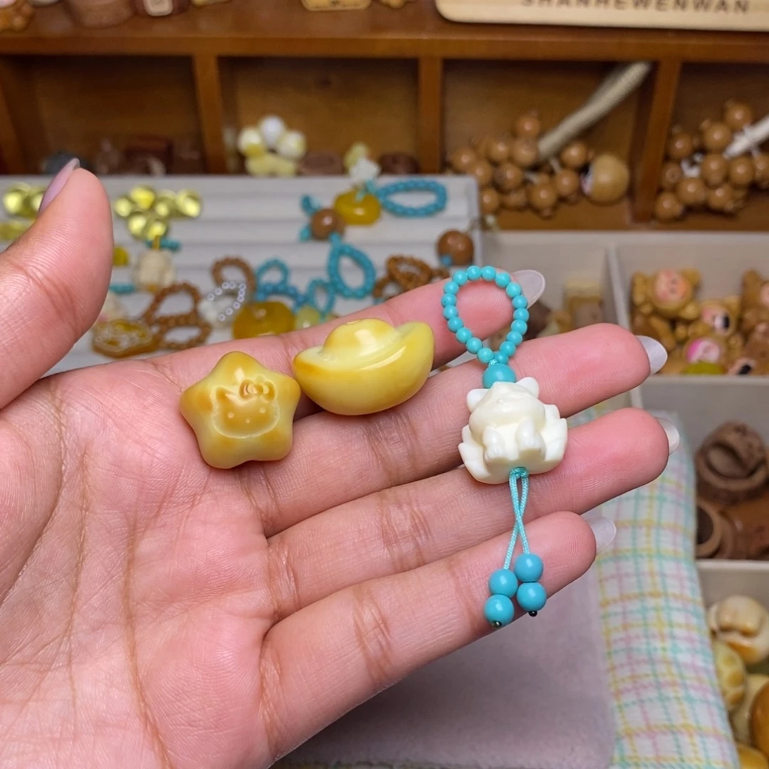 一***花猴头核桃吊坠星星 元宝 菱镁矿狐狸滴流