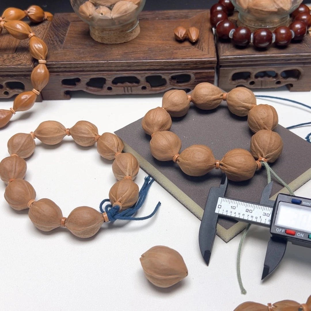 橄榄核手串/手链、**。梅林铁核笑脸一颗