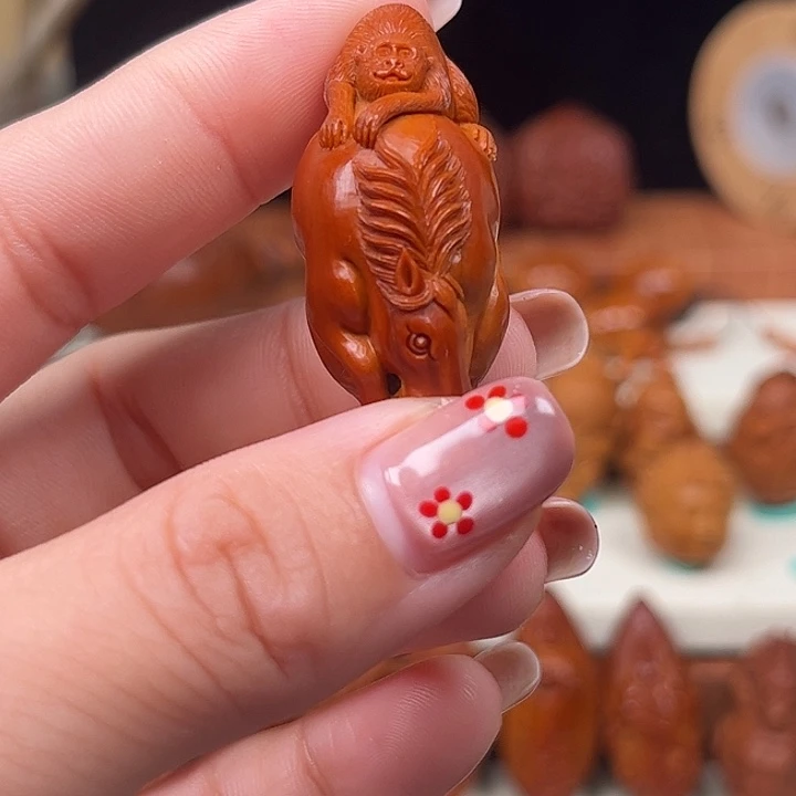 龍***人橄榄核手串/手链马上封侯