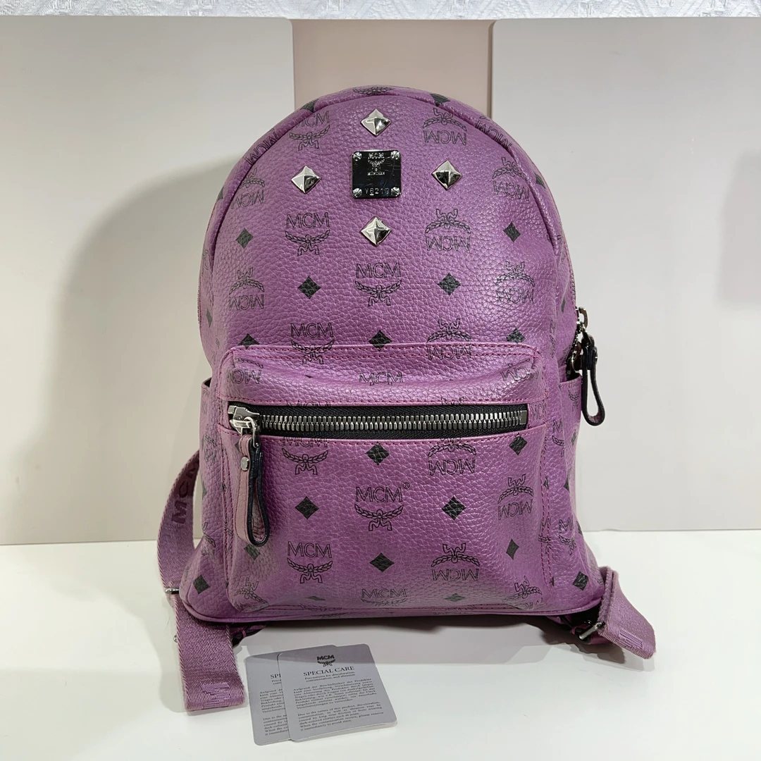 95新 MCM MCM紫色老花双肩包cj6019