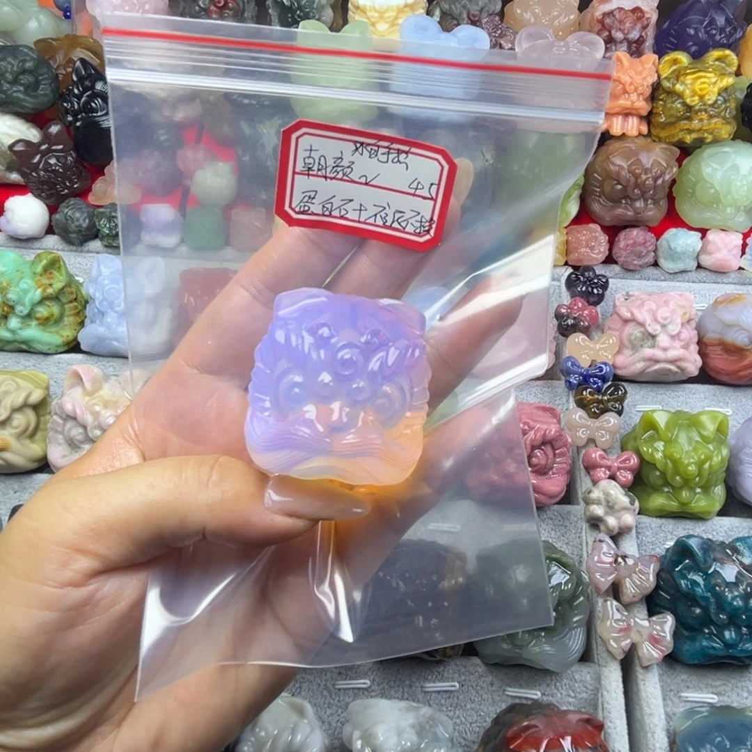朝***颜大理石磁石醒狮手把件