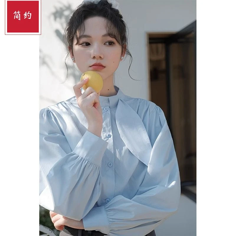 奶黄色长袖衬衫女款2025年春季洋气泡泡袖上衣设计感白衬衣薄款