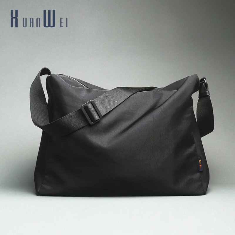 轩唯无性别男士斜挎包新款运动高级感痞帅尼龙休闲大容量单肩包女