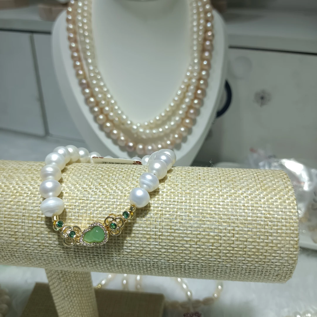 合金贝壳手链 6－7毫米 自然光微瑕近圆  真珍珠精品卡扣手链百搭