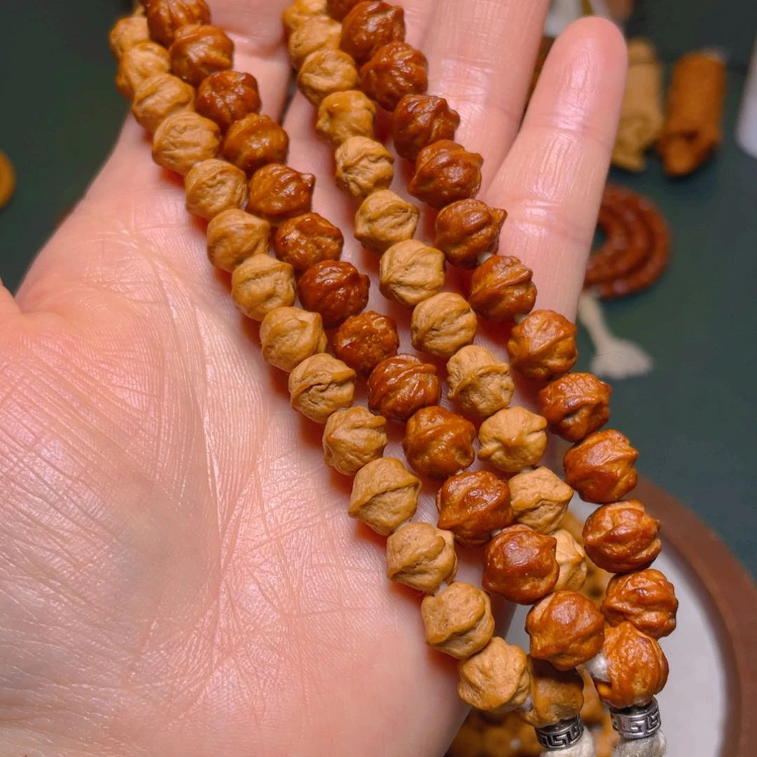 吊坠柏香籽/百香籽白牙横打手持