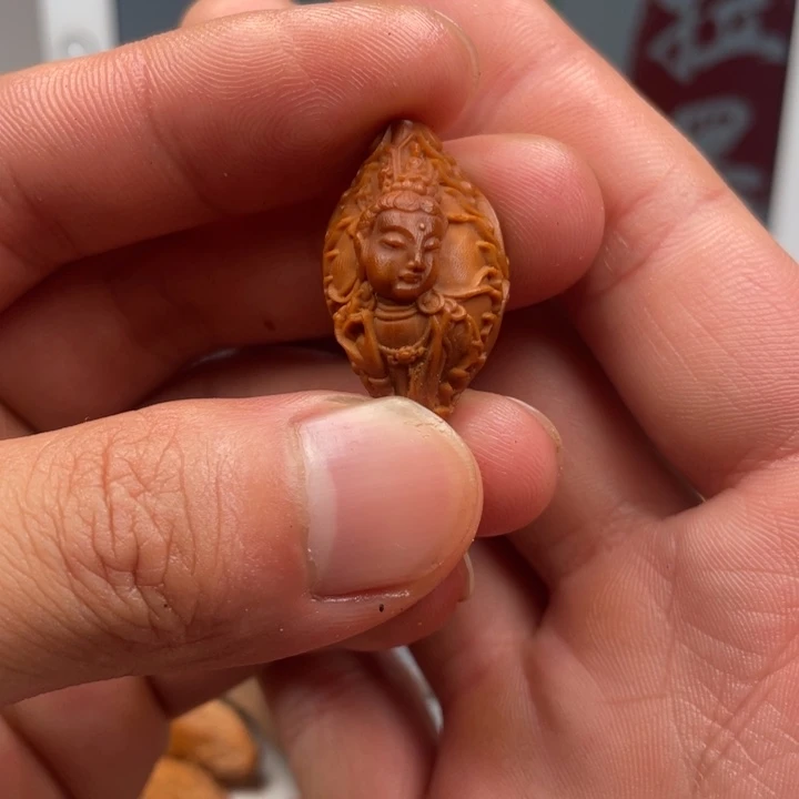 橄榄核吊坠橄榄核雕刻单子。