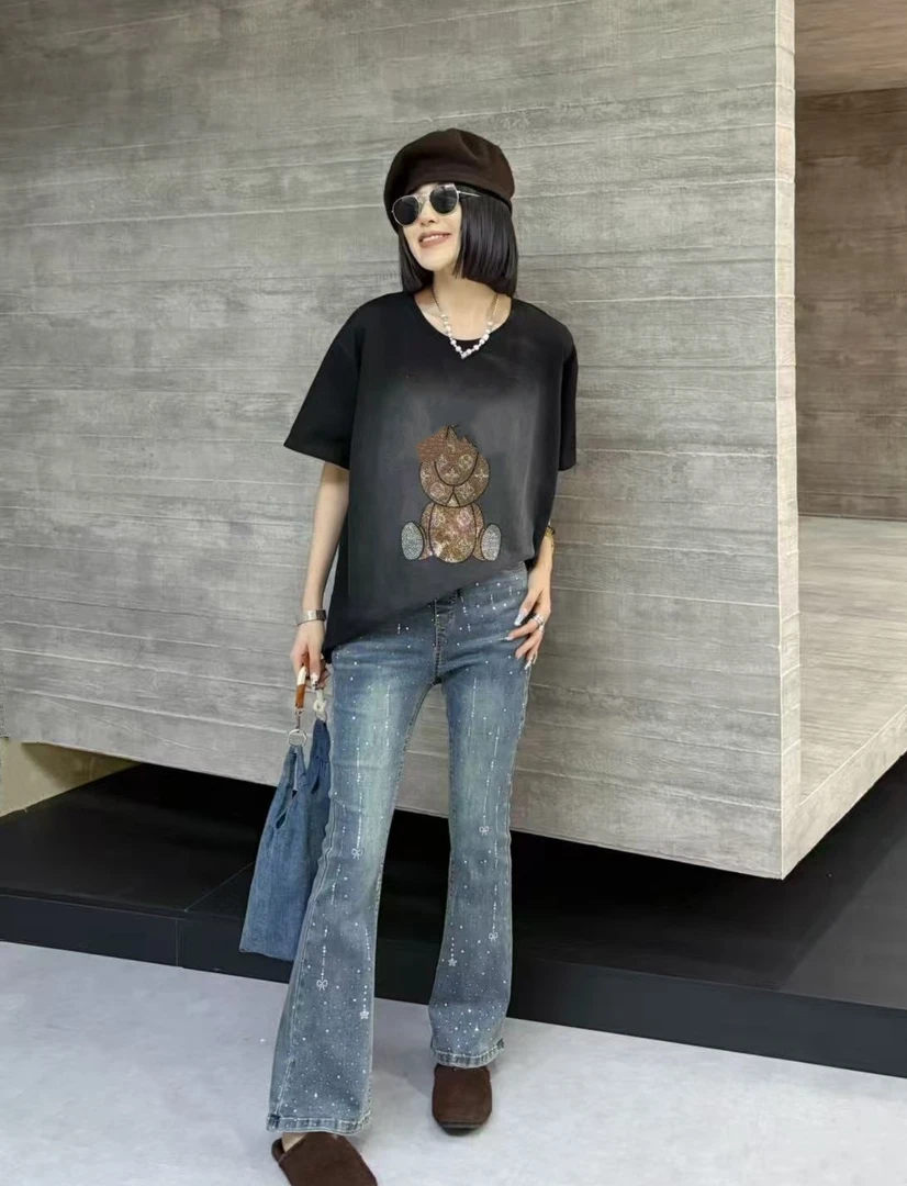 奇奇家时尚韩版大码女装2025秋季新款高腰高弹重工压钻牛仔微喇裤