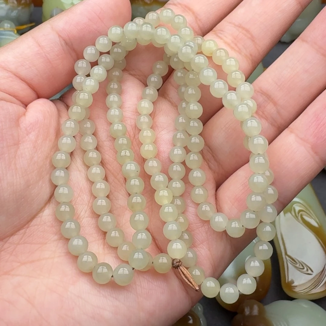 否***。和田玉未镶嵌颈饰