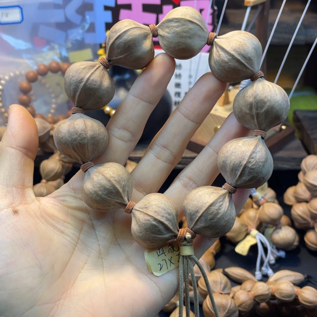 ****淡橄榄核吊坠2728四花铁核