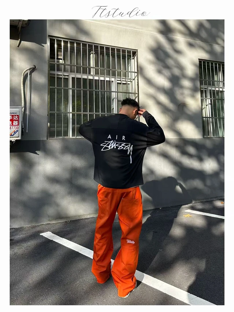 Ttstudio户外暗橘色冲锋裤秋新款三防弯刀可调节版型工装冲锋裤