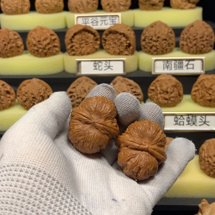余***∽桃核把件平谷元宝核桃