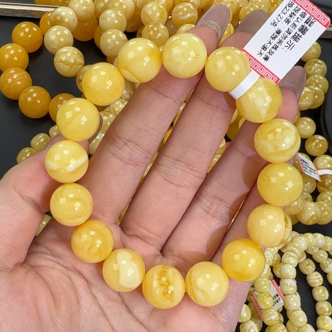 琥珀未镶嵌手链23.2黄白妖花