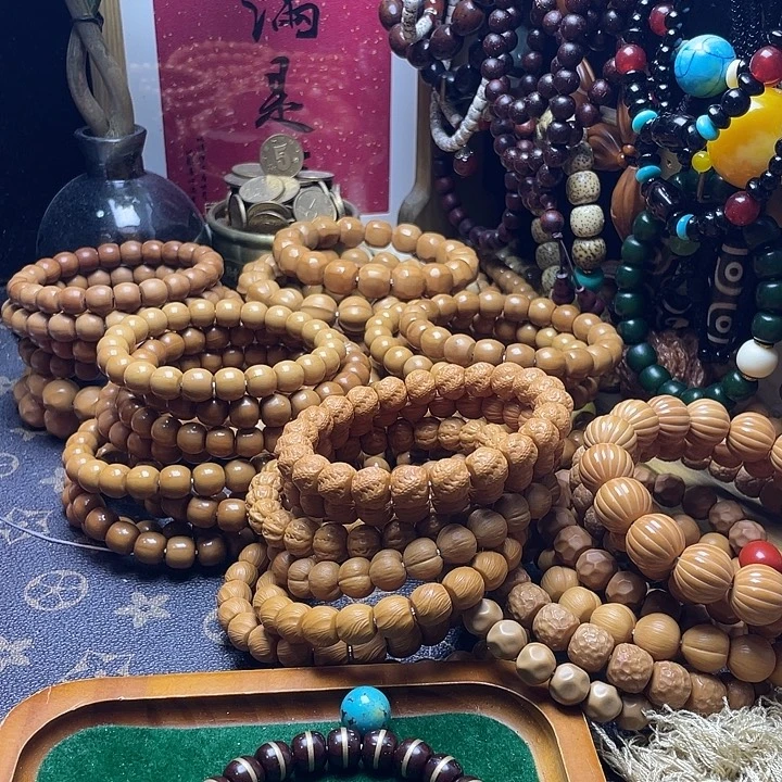 起***子猴头核桃吊坠紫金鼠