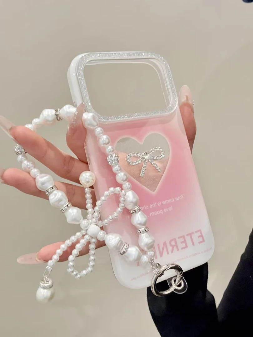 韩系粉白晕染镂空爱心蝴蝶结适用iphone17pro/苹果1615手机壳防摔
