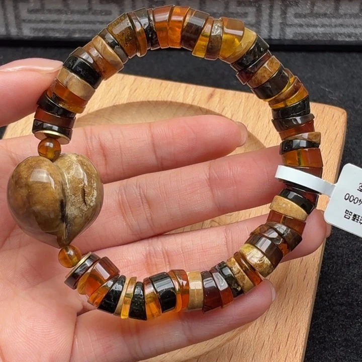 琥珀未镶嵌珠宝奇石屁桃多宝猪大肠（有瑕