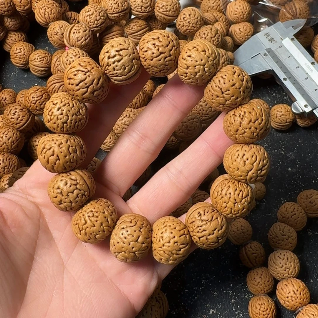 意***发桃核吊坠苹果园手串