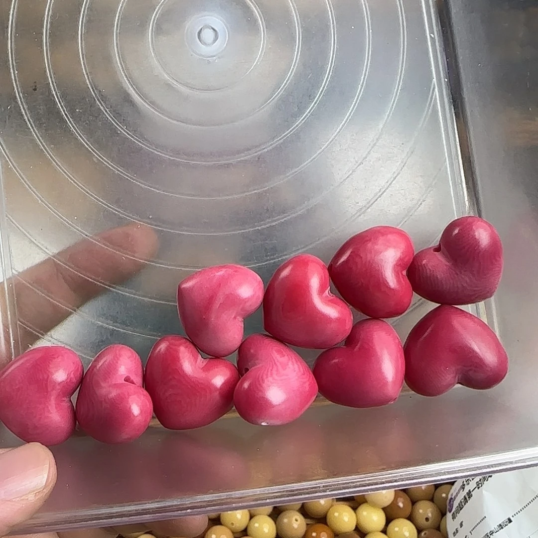 爱***戴菩提根/象牙果手串瑕粉色爱心10颗