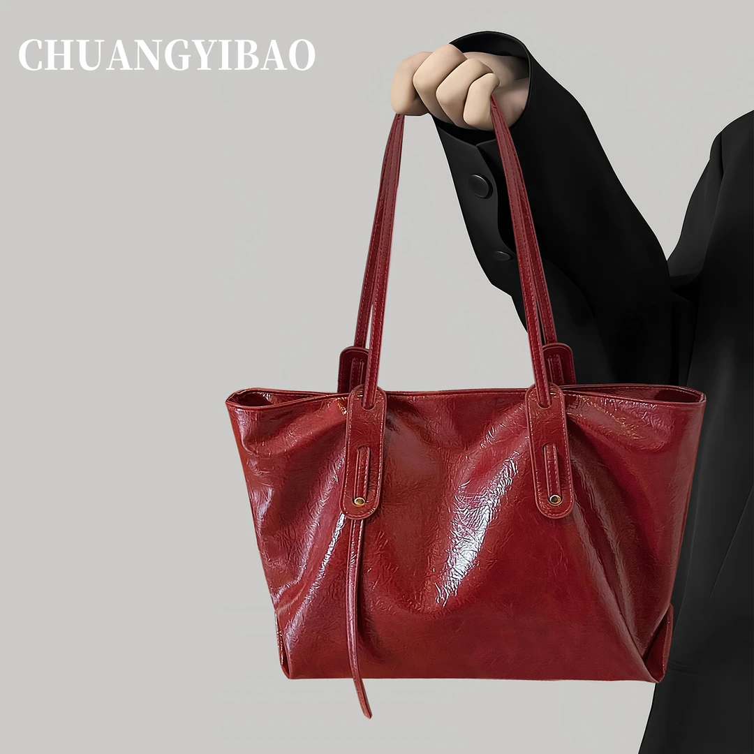 大容量托特腋下包包女式2025新款秋冬轻奢小众高级感通勤红色婚包