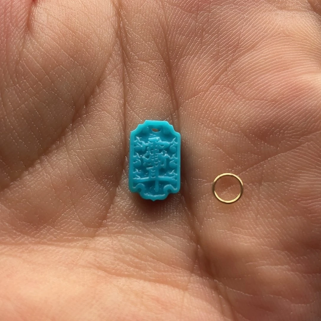 呦***呀未镶嵌绿松石耳饰