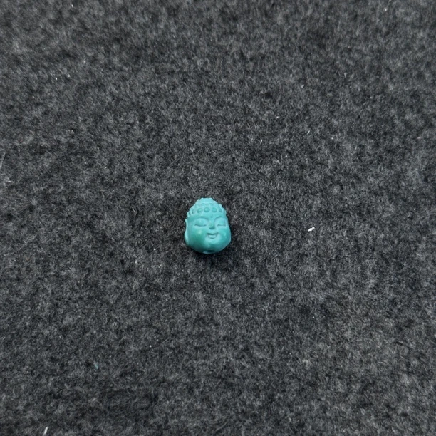 绿松石雕刻件宝宝佛首