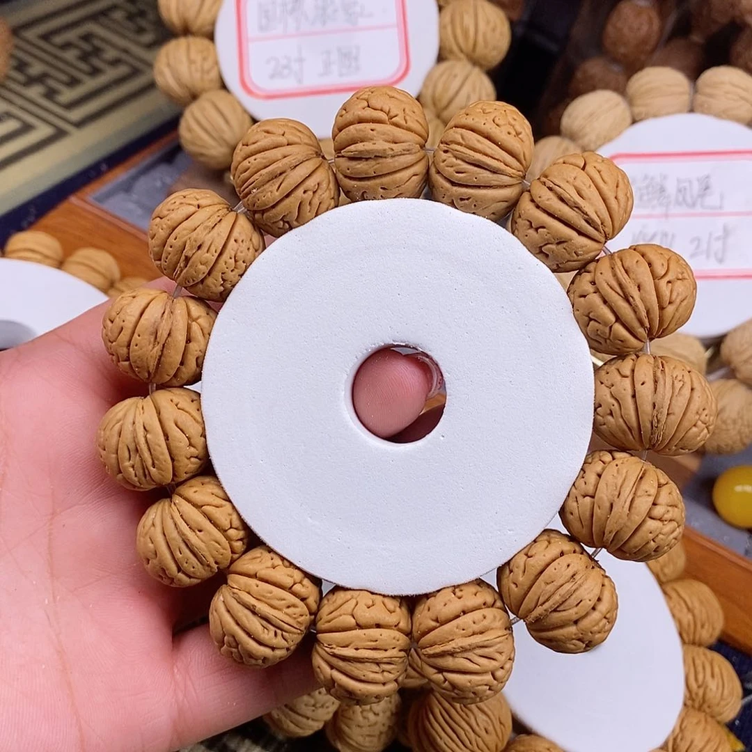 桃核手串?**?老树金鱼肚21