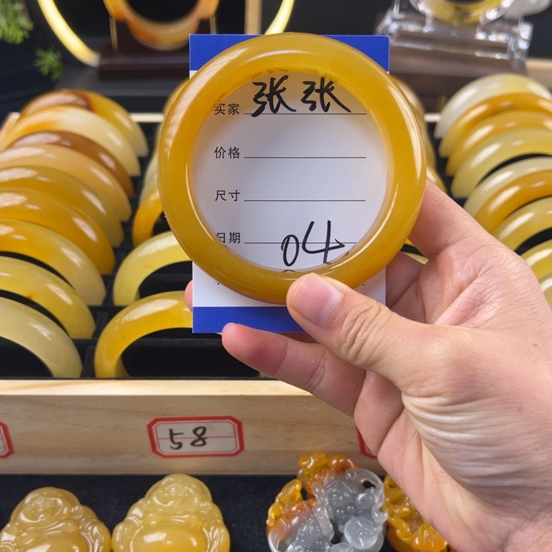张***_非金属鸡油黄58圈04