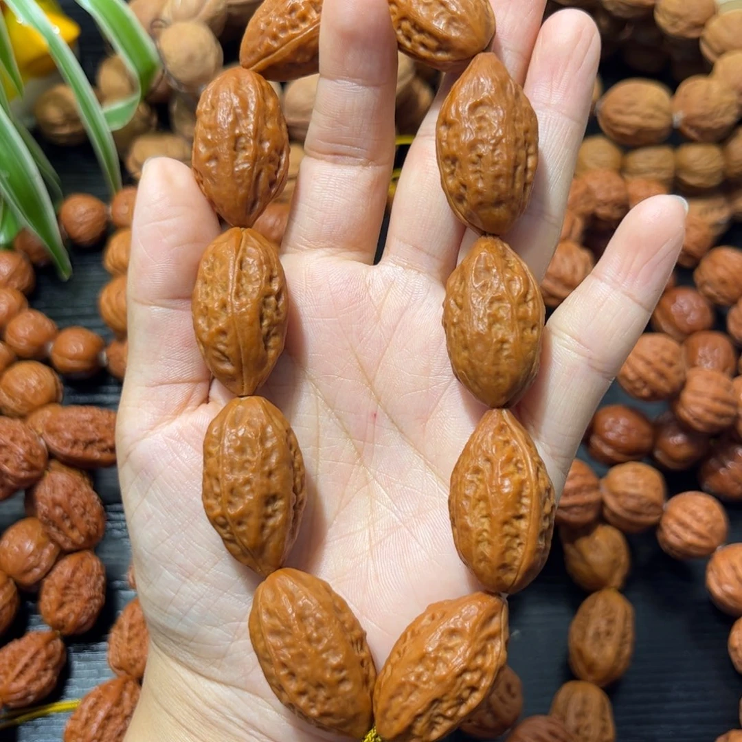 吊坠桃核子弹头手持