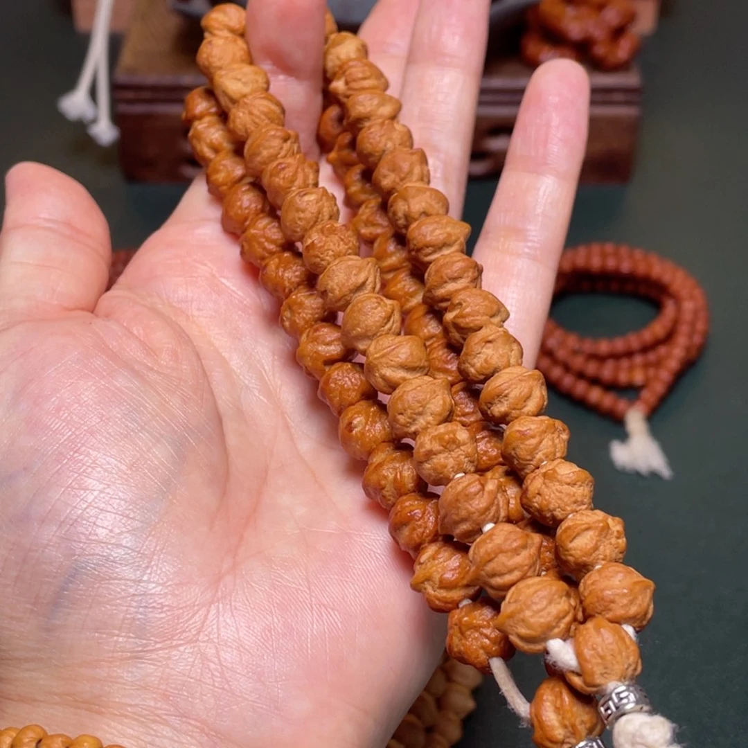 柏香籽/百香籽吊坠白牙横打手持