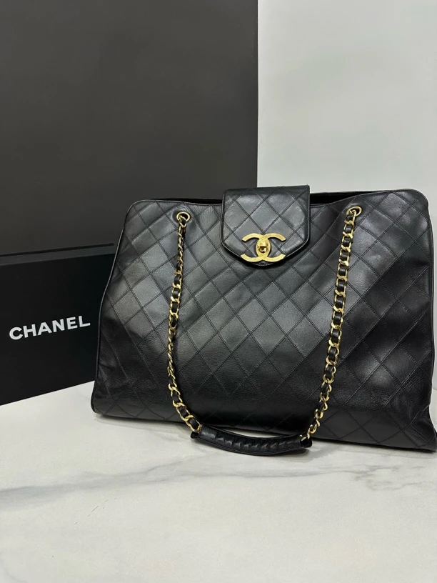 95新 Chanel/香奈儿 黑金菱格xxl机场包1开46cm/JJ5010902